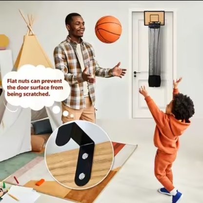 Dad and child playing basketball with Slam Hamper on bedroom door